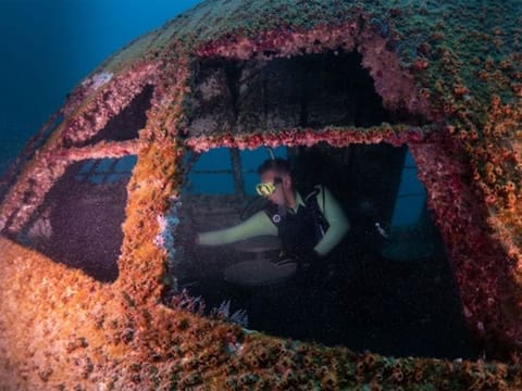 A 70-meter long Boeing 747 was submerged to become the first attraction of the 100,000 m2 theme park area.