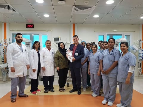 Dr Mazen Salowm and Team with Joud and his mother