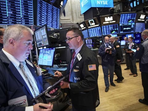 File picture of traders on the floor of the New York Stock Exchange (NYSE). The 'Santa' spirit has clearly overtaken the markets.