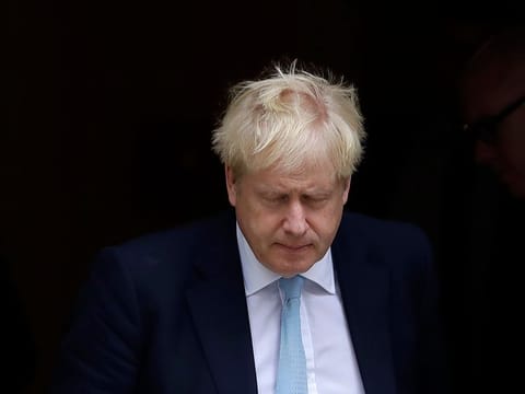 Britain's Prime Minister Boris Johnson leaves Downing Street to attend Parliament in London, Thursday, Oct. 3, 2019.