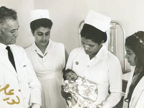 Renowned UAE photographer Noor Ali Rashid took a photo of the first baby born in Kuwait Hospital, Bur Dubai 1967. Atheeja Boussaiba (second from left) was at the hospital training as a nurse.