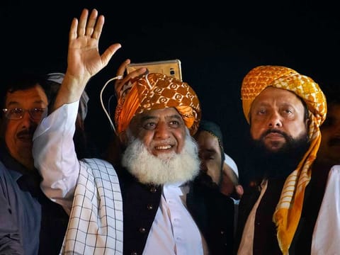 Maulana Fazlur Rehman (left) at Azadi March says that he will not leave Islamabad without Prime Minister Imran Khan's resignation.