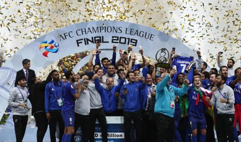Members of Al Hilal squad celebrate their victory in the Asian Club Championship in Saitama, Japan today.