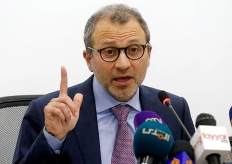 Lebanon's caretaker Foreign Minister Gebran Bassil gestures as he speaks during a news conference in Beirut, Lebanon December 12, 2019. REUTERS/Mohamed Azakir