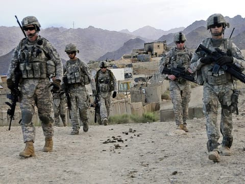In this file image US soldiers depart Forward Operating Base Baylough, Afghanistan to conduct a patrol