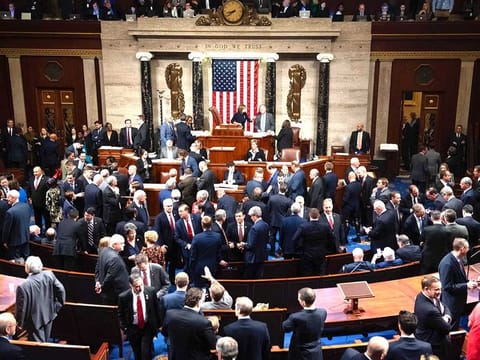US Speaker of the House Nancy Pelosi presides over Resolution 755, Articles of Impeachment Against President Donald J. Trump as the House votes at the US Capitol in Washington, DC.