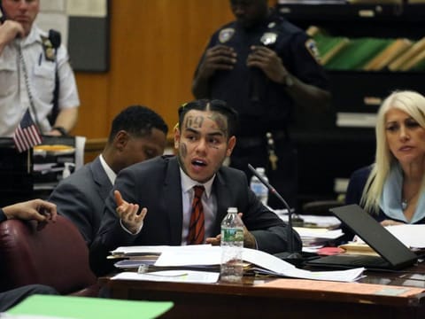FILE -- Daniel Hernandez, the rapper and Instagram star known as Tekashi69 as well as 6ix9ine, during sentencing in state Supreme Court in Manhattan, Oct. 26, 2018. Hernandez was sentenced to two years in prison on Wednesday, Dec. 18, 2019, by a federal judge who gave him credit for helping prosecutors send several of his former gang associates in the Nine Trey Gangsta Bloods to prison. (Jefferson Siegel/The New York Times)