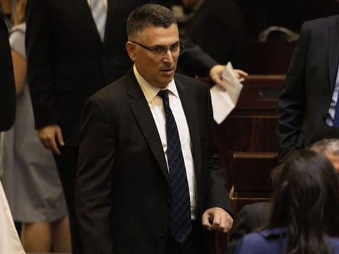 In this Thursday, Oct. 3, 2019 photo, Gideon Saar, attends the swearing-in of the new Israel's parliament in Occupied Jerusalem.