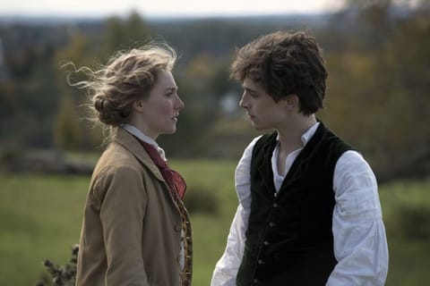 Saoirse Ronan and Timothée Chalamet in "Little Women." . MUST CREDIT: Handout photo by Wilson Webb/Columbia Pictures