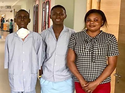 Jehozadak (left) with his donor brother and wife after successful bloodless liver transplant surgery in Bangalore, India.