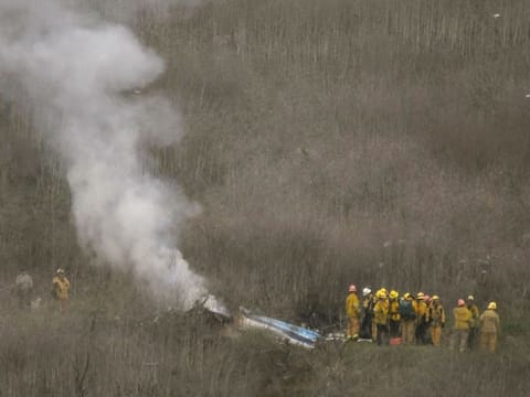 LA county firefighters on the scene of the helicopter crash that killed Kobe Bryant in Calabasas on Sunday.