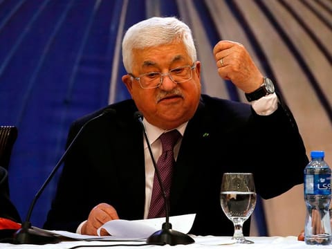 Palestinian president Mahmoud Abbas gestures as he delivers a speech in the West Bank city of Ramallah