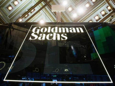 File photo: A Goldman Sachs sign is seen above the floor of the New York Stock Exchange shortly after the opening bell in the Manhattan borough of New York January