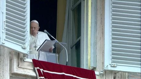 Pope Francis coughs as he leads the weekly Angelus prayer in St Peter's Square at the Vatican on Sunday.