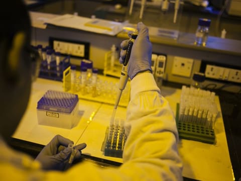 An employee works at one of India’s pharmaceutical drug makers in Mumbai. India, the world’s main supplier of generic drugs, has restricted the export of 26 active pharmaceutical ingredients (APIs) and the medicines made from them.