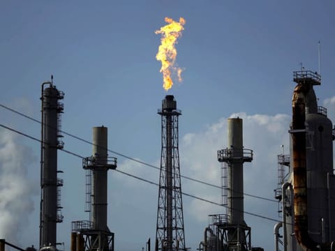 An oil refinery hums as demand falters. The International Energy Agency warns that global oil use is set for its steepest quarterly drop since the Covid shock. Its latest outlook points to weakening consumption in April and through the second quarter, as trade tensions and a slowing economy sap fuel demand.
