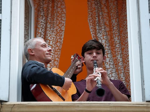 Italians sing out from balconies during the ongoing coronavirus lockdown