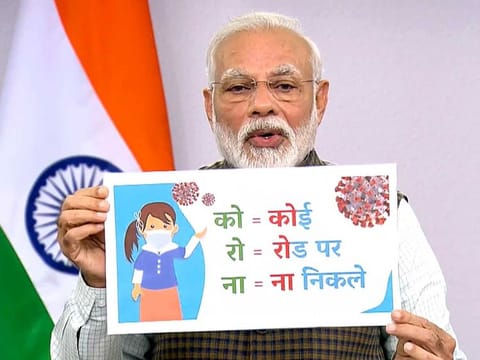 Indian Prime Minister Narendra Modi addresses the nation on COVID-19, in New Delhi on Tuesday. India ordered a 21-day lockdown of its 1.3 billion people to prevent the spread of the coronavirus.