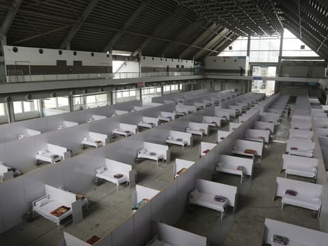 An emergency hospital is set up with nine hundreds beds for coronavirus infected patients, in the Expo Centre in Lahore.