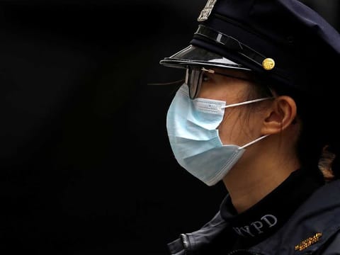 A member of the New York Police Department works during the outbreak of the coronavirus disease (COVID-19) in Manhattan, New York City, on March 30, 2020.