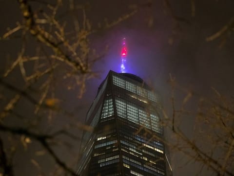 One World Trade Center Tower is illuminated in red, white, and blue in recognition of the ongoing nationwide effort to combat the outbreak of coronavirus disease (COVID-19), in the Manhattan borough of New York City, New York, U.S., March 30, 2020.