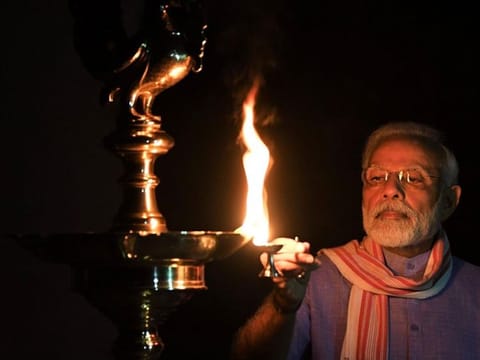 Modi urged Indians to light lamps to express unity in fight against the coronavirus pandemic
