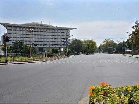 A deserted view of the Mall Road, one of Lahore's busiest roads, as people restrict their movements due to lockdown in Pakistan's Punjab province to combat COVID-19 outbreak.