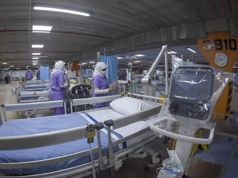 Medical staff are seen in the newly-inaugurated intensive care unit for COVID-19 patients at the Bahrain Defence Force Hospital in Riffa on April 14.