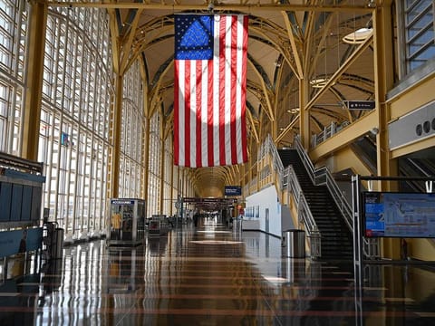 The hallways and aisles are deserted at US airports and elsewhere in the world. But US airlines receiving government aid will need to pay some of it back, and that's something they want to avoid.
