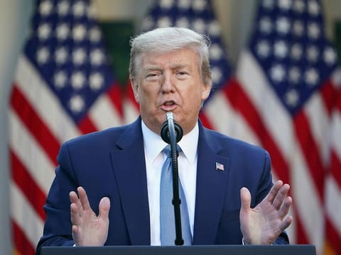 US President Donald Trump gestures as he speaks during the daily briefing on the novel coronavirus, which causes COVID-19, at the White House on April 15, 2020, in Washington, DC.