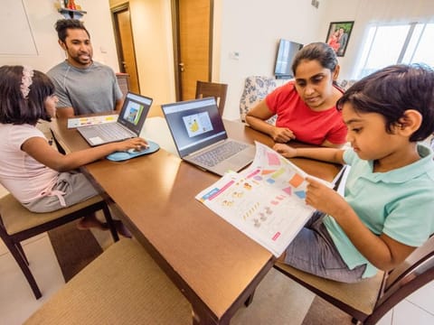 Left to Right, Ayanca Deanne, Nalin Fernando, Nirmali Fernando and Aidan Fernando, doing e-learning from home during the Dubai lockdown in their appartment in Al Nada. Dubai. Photo: Antonin Kélian Kallouche/Gulf News