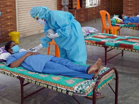 A mock drill underway at Cheranellur, Kochi, in the southern Indian state of Kerala, as part of efforts to prevent the spread of COVID-19 on April 17.