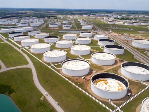 Crude oil storage tanks are seen in an aerial photograph at the Cushing oil hub in Cushing, Oklahoma, U.S. File photo taken on April 21, 2020.