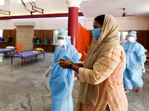 Doctors participate in a real time mock drill conducted at Cheranellur during the COVID-19 outbreak, in Kochi on April 17, 2020. Kerala chief minister has sought help from Prime Minister Narendra Modi to overcome difficulties in bringing back the bodies of NRIs who have died in the Gulf region of non-COVID-19 causes.