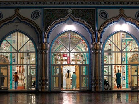 Muslim worshippers attend evening prayers after ending their fast on the first day of Ramadan in Rawalpindi, Pakistan, on April 25, 2020.