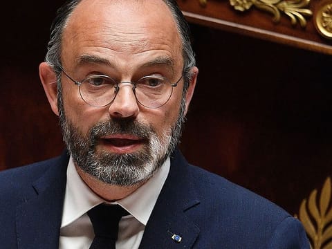 French Prime Minister Edouard Philippe delivers a speech as he presents the government's plan to exit from the lockdown situation at the French National Assembly in Paris on April 28, 2020.