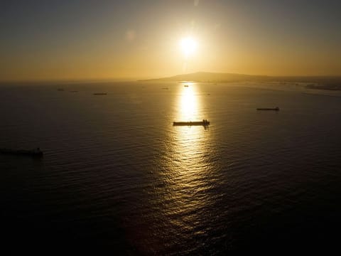 Oil is still seeing a glut, and each month of subdued demand will add to it. It is against this backdrop that oil giants will have to price their wares.