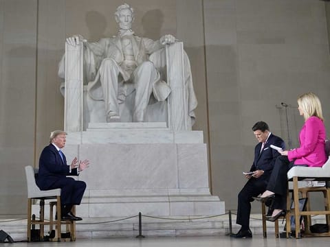 US President Donald Trump participates in a live Fox News Channel virtual town hall called "America Together: Returning to Work" with hosts Bret Baier and Martha MacCallum about the response to the coronavirus disease (COVID-19) pandemic being broadcast from inside the Lincoln Memorial in Washington, US, May 3, 2020.