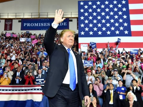 US President Donald Trump arrives for a 'Make America Great Again' rally at Eastern Kentucky University, in Richmond, Kentucky, earlier.