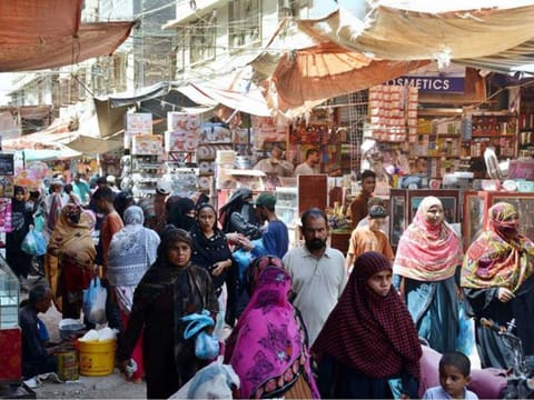 Public throng the markets and bazaars for shopping in Karachi, ignoring the government's instructions to prevent COVID-19 spread after the lockdown was eased.