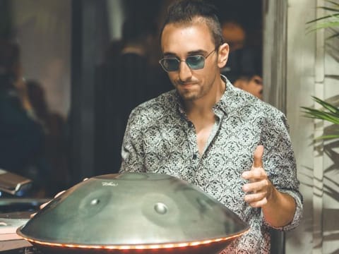 Walter Scalzone plays the Handpan from his Dubai Marina apartment every Sunday