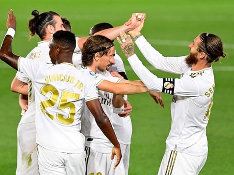 Real Madrid's Sergio Ramos (right) celebrates with teammates after scoring against Mallorca.