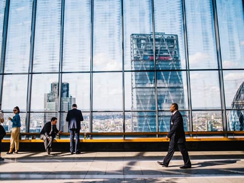 What is the new law and which companies can apply for 100 per cent ownership?