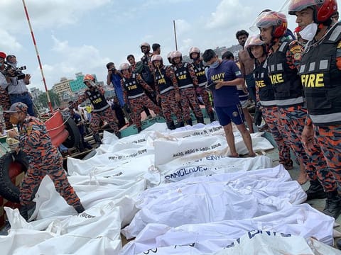 Dead bodies are retrieved after a passenger ferry capsized in the river Buriganga in Dhaka, Bangladesh, June 29, 2020.