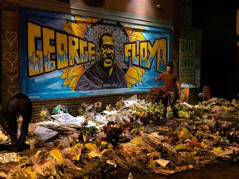 A makeshift memorial for George Floyd near the site where he was detained and died with the knee of a police officer on his neck, in Minneapolis, Minn., June 2, 2020. Newly released transcripts of Minneapolis police body camera footage offer one of the most thorough and dramatic accounts yet of the moments before Floyd’s death.