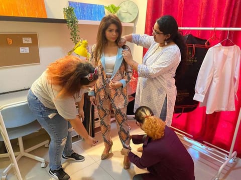 Aparna Bajpai of Being She showcasing one of the sustainable outfits designed by Amity University students