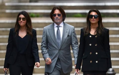 Actor Johnny Depp leaves the High Court in London, Britain, on July 16, 2020.