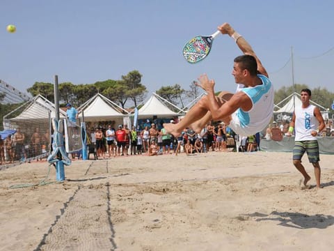 A game of beach tennis is in progress at Dubai's Kite beach.