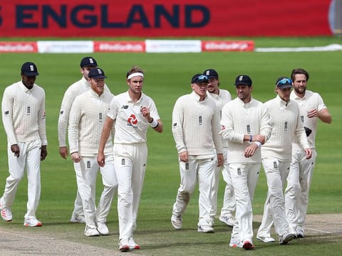 England players leave the pitch after winning the third Test cricket match against West Indies at Old Trafford in Manchester, northwest England on July 28, 2020.