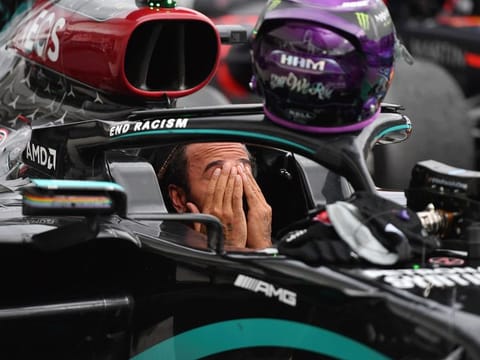 Mercedes ace Lewis Hamilton reacts after winning the Hungarian Formula One Grand Prix at the Hungaroring racetrack in Mogyorod, Hungary on July 19.